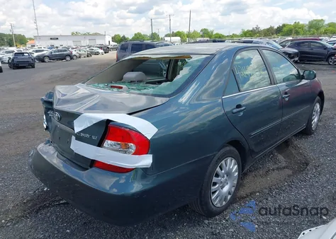 2004 Toyota Camry Xle z USA, uszkodzony, nr VIN 4T1BE30KX4U286835